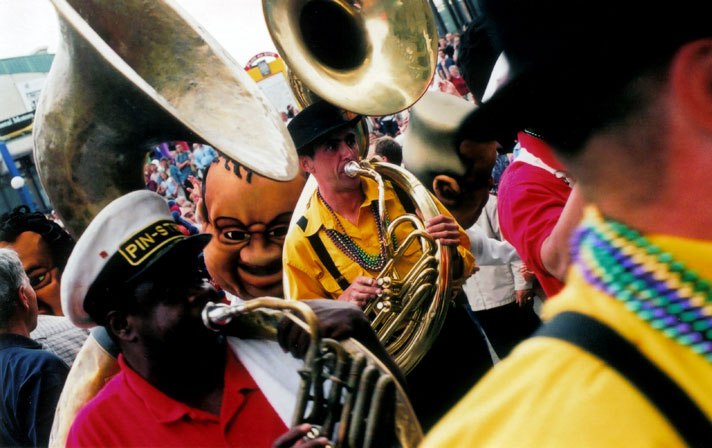 A Mardi Gras band takes the streets during the Montreal Jazz Festival
